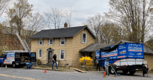 AQRS crew working on roof in Leeds, MA