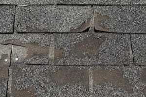 shingles with damage and missing granules