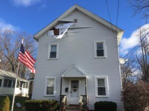 Damage Caused to Siding by Wind