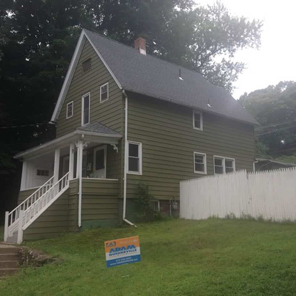 This is an after photo of a roof replacement project in Holyoke, MA