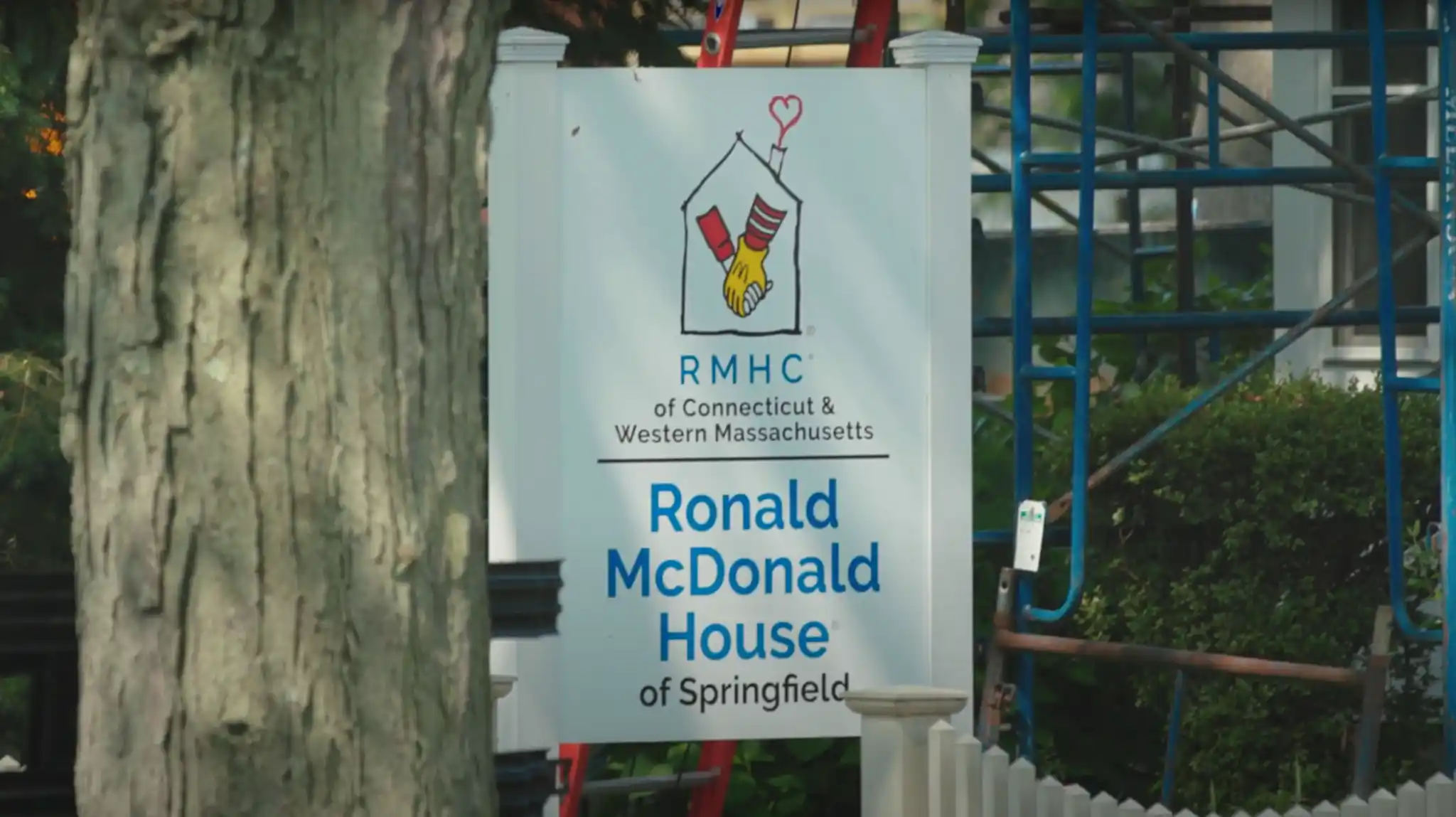 a sign with a logo on it