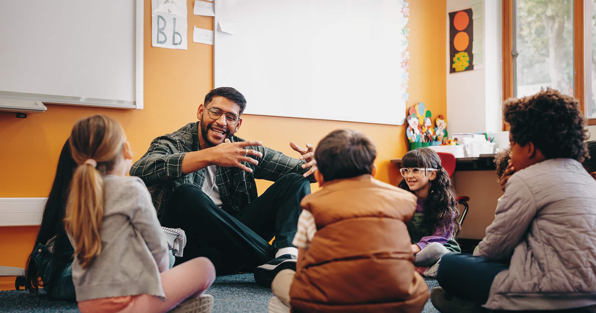 teacher sitting in classroom